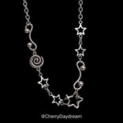 Silver Spiral Star and Wavy Chain Necklace