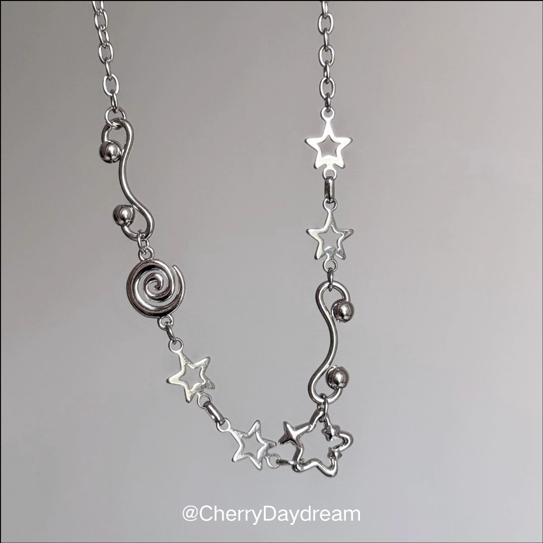 Silver Spiral Star and Wavy Chain Necklace